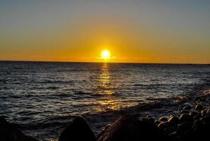 tramonto sul mare foto