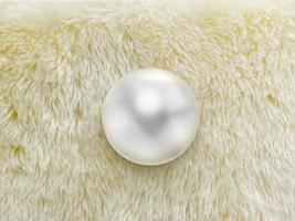 un' bellissimo perla su un' finto pelliccia sfondo. foto