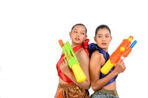 Due bellissimo donna nel Songkran Festival con acqua pistola foto