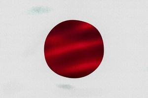 3d-illustrazione di una bandiera del Giappone - bandiera sventolante realistica del tessuto foto