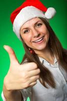 allegro ragazza nel un' Natale cappello foto