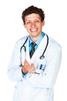 ritratto di un' sorridente maschio medico mostrando dito a voi su bianca foto