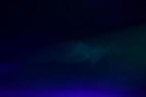 buio blu fumoso leggero scena illuminazione. blu mistico sfondo con Fumo. foto