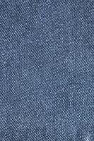 jeans blu scuro si chiudono in verticale foto