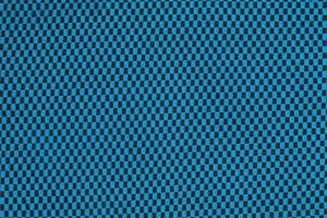 sintetico tessuto struttura, blu plaid, bellissimo sfondo modello. frammento di termico biancheria intima tessuto. foto