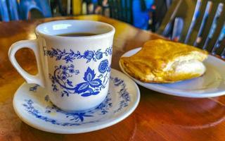 tipico messicano piatti empanadas tamales rollos con caffè oaxaca Messico. foto