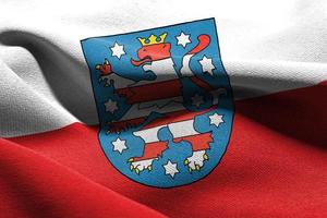 illustrazione 3d La bandiera della Turingia è una regione della Germania. salutando foto