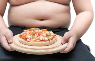 Pizza nel legna piatto con obeso Grasso ragazzo sfondo foto