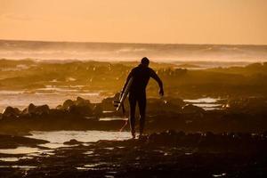 kitesurfer a tramonto foto