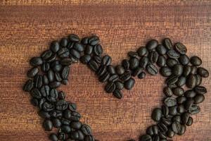 caffè fagiolo su di legno tavolo foto