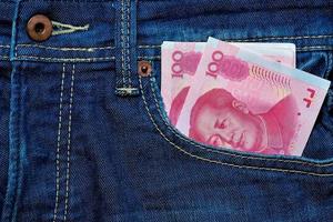 yuan o rmb nel jeans tasca, Cinese moneta foto