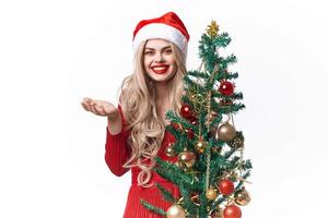 bella donna vacanza Natale decorazione Natale albero leggero sfondo foto