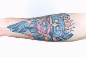 tatuaggio su braccio avvicinamento stile di vita leggero sfondo foto