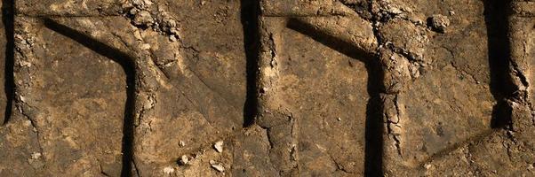 battistrada della superficie ruvida della ruota come sfondo, vista dall'alto foto