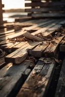 vecchio di legno molo su il spiaggia a tramonto. selettivo messa a fuoco foto