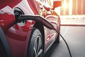 vicino su ricarica un elettrico auto batteria, nuovo innovativo tecnologia ev elettrico veicolo foto