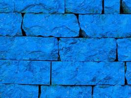 primo piano di pietra blu o parete di roccia per lo sfondo o la trama foto