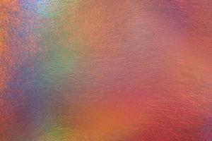 uno sfondo di lamina olografica iridescente colori pastello foto