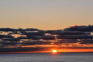 tramonto sul mare foto