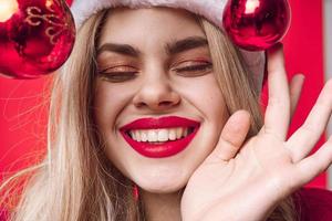 donna bionda con rosso labbra fascino cosmetici Natale avvicinamento foto