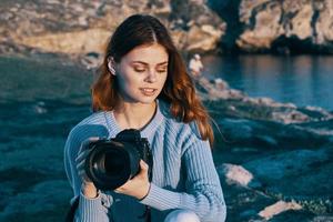 bella donna fotografo viaggio paesaggio telecamera foto