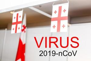 nazione bandiere con testo coronavirus su esso. 2019 - 2020 romanzo coronavirus 2019-ncov concetto, per un scoppio si verifica nel Germania. foto