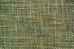 colore tessuto struttura. di lana morbido spiegazzato tessuto di un' verde ombra. copia spazio. foto
