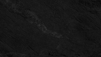 buio sfondo struttura di naturale pietra foto
