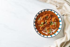 pollo tikka masala cibo piccante a base di carne al curry foto