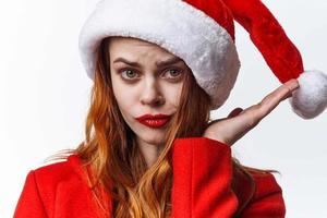 donna indossare Santa cosmetici costume in posa moda vacanza Natale foto