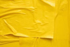 vuoto giallo spiegazzato e sgualcita carta manifesto struttura sfondo foto