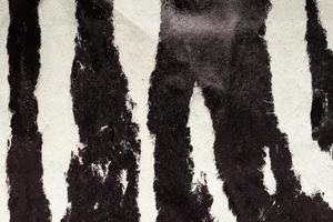 vecchio grunge strappato strappato nero carta manifesto superficie struttura sfondo foto