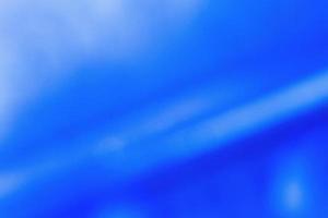 astratto leggero blu sfocato brillare sfondo con pendenza foto