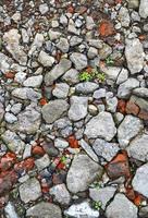 sfondo con frammenti di mattone e calcestruzzo foto