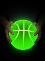 pallacanestro palla luminosa verde neon luci nel maschio mani foto