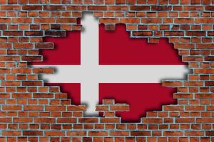 3d bandiera di Danimarca dietro a il rotto vecchio pietra parete sfondo. foto