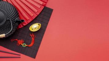 teiera e ciondolo per il capodanno cinese foto