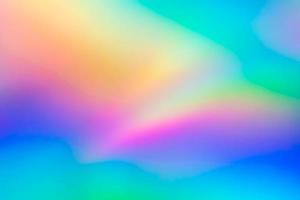 astratto sfocatura olografico arcobaleno Foglio iridescente sfondo foto