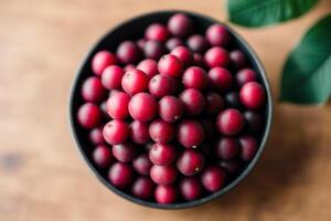 delizioso mirtilli nel un' ciotola su un' di legno tavolo, superiore Visualizza. nero ribes frutti di bosco. salutare cibo concetto. generativo ai foto