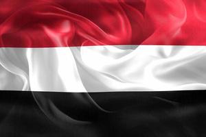 3d-illustrazione di una bandiera dello yemen - bandiera sventolante realistica del tessuto foto