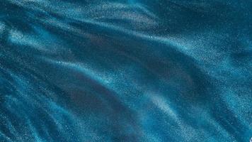 particelle in acqua colorante blu foto
