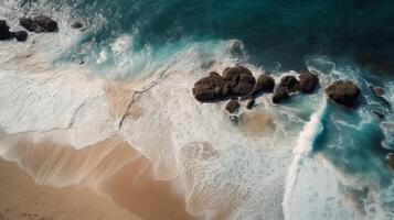 aerotrasportato vedere di sabbioso litorale con onde e chiaro mare acqua. ai generato foto