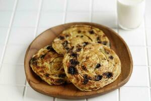 roti canai coklat o roti maryam coclea, cioccolato canai pane foto