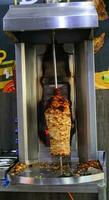 Manuale inossidabile acciaio shawarma macchina, gas Salvataggio shawarma macchina pollo foto