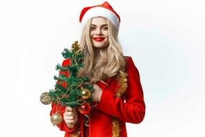bella donna vestito come Santa Natale vacanza in posa decorazione foto