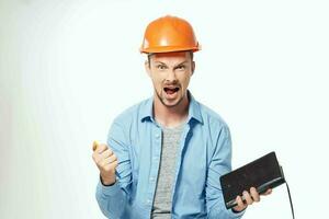 uomo nel costruzione uniforme professionale lavoro isolato sfondo foto