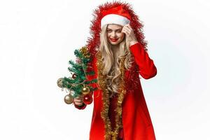 donna vestito come Santa vacanza decorazione Natale albero foto