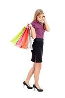 un' donna con shopping borse foto