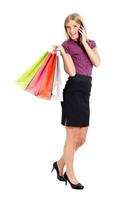 un' donna con shopping borse foto