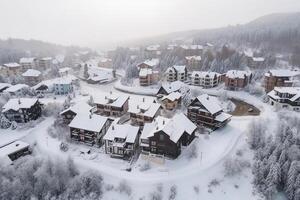 sciare ricorrere, montagna sciare Hotel sotto il neve, tiro a partire dal un' drone. generativo ai foto
